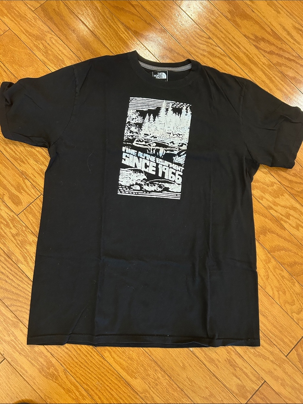 The North Face Black Short Sleeve Tee with White Outdoor Graphic